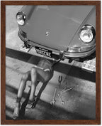 Poster Master Woman Under Classic Car Poster by PosterMaster