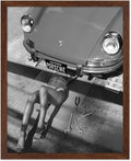 Poster Master Woman Under Classic Car Poster by PosterMaster