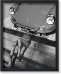 Poster Master Woman Under Classic Car by PosterMaster